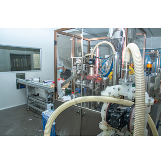 Tube filling and sealing machine Tube filling and sealing machine